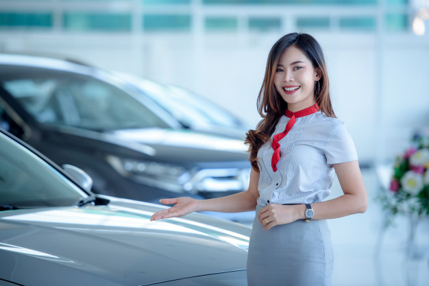 beautiful-asian-salespeople-are-happy-sell-new-cars-showroom-have-customers-come-buy-cars-car-dealers_140555-111